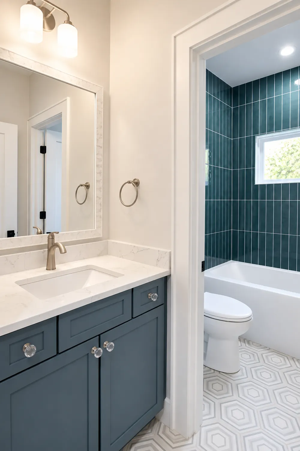 Saloli — Teal-tiled bathroom